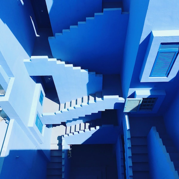 A maze of stairs between buildings.